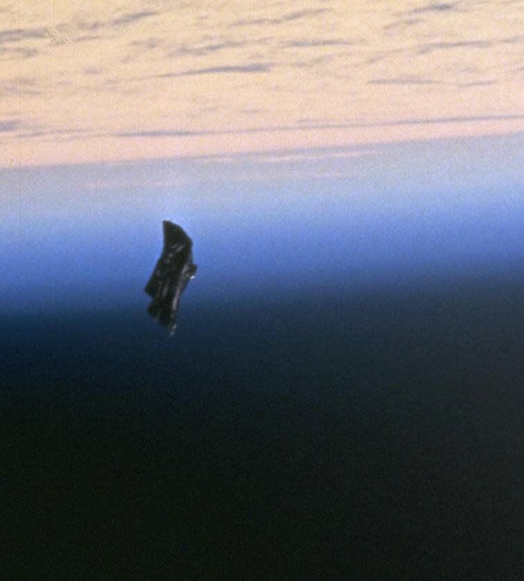 NASA photo STS088-724-66 of the object nicknamed the Black Knight, most likely a lost thermal blanket