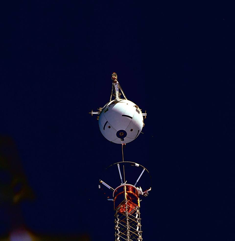 The Tethered Satellite System deploying from Columbia during STS-75, 1996